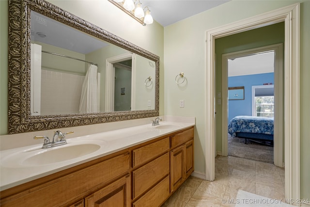 bathroom with vanity and curtained shower