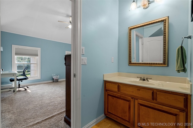 bathroom featuring vanity and ceiling fan