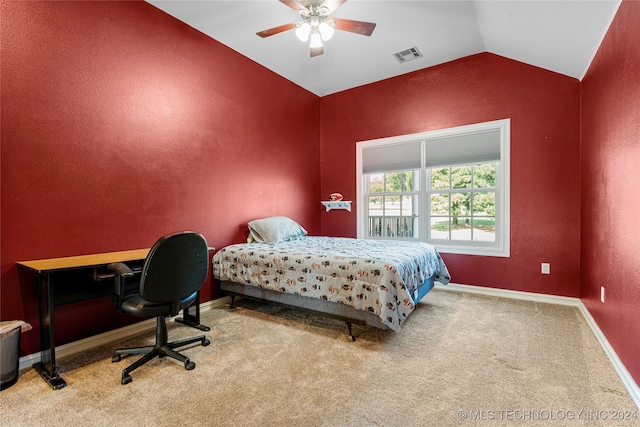 bedroom with carpet, ceiling fan, and vaulted ceiling