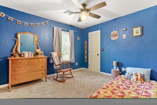 carpeted bedroom featuring ceiling fan