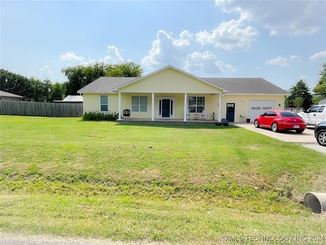 ranch-style house with a garage, a porch, and a front yard