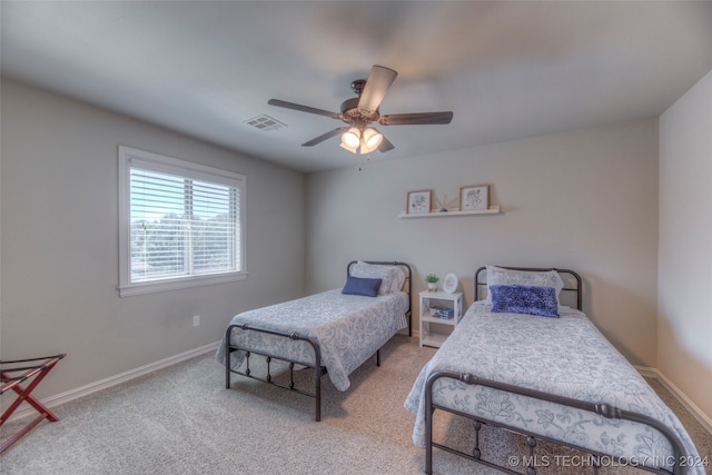 bedroom featuring carpet floors and ceiling fan