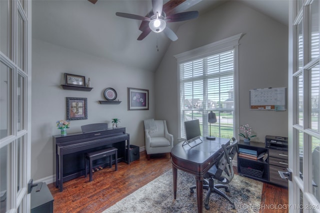 office with french doors, vaulted ceiling, plenty of natural light, and dark wood-type flooring