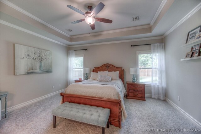 bedroom featuring light carpet, ceiling fan, and ornamental molding