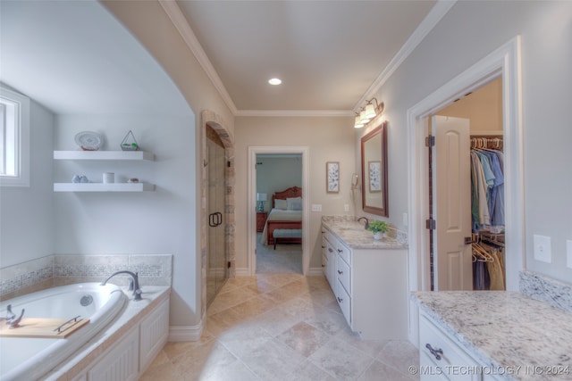 bathroom with tile patterned floors, crown molding, vanity, and plus walk in shower