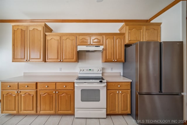 kitchen with white range with electric cooktop, stainless steel refrigerator, crown molding, and light tile patterned floors