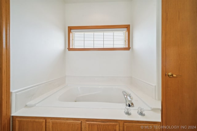 bathroom with a bath