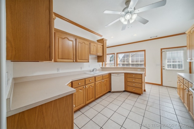 kitchen with a wealth of natural light, white dishwasher, ceiling fan, and crown molding