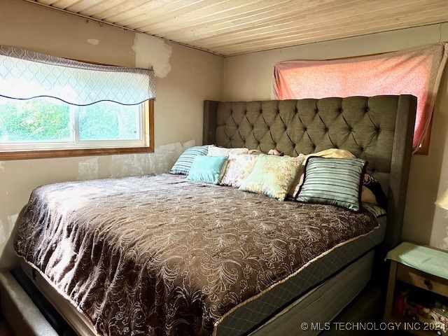 bedroom featuring wood ceiling