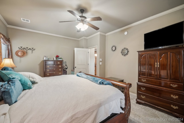 bedroom featuring ceiling fan, light colored carpet, and ornamental molding