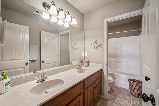 full bathroom featuring  shower combination, vanity, and toilet