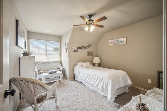 bedroom featuring carpet, lofted ceiling, and ceiling fan