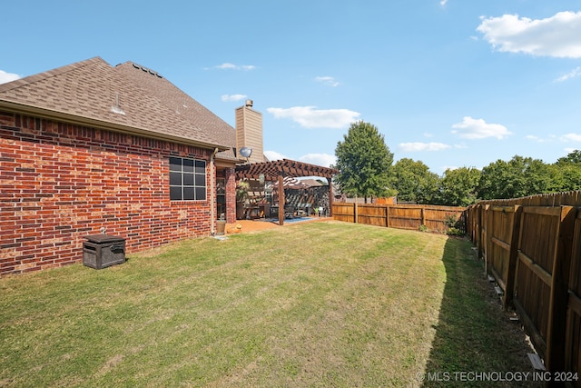 view of yard featuring a patio and a pergola