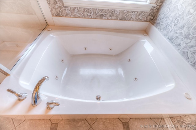 bathroom featuring a whirlpool tub