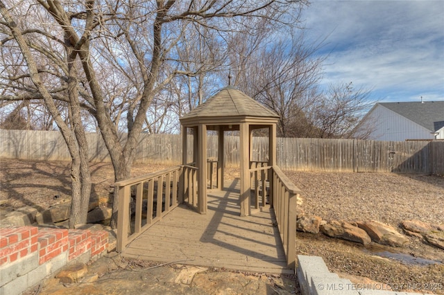 view of yard featuring a gazebo and a fenced backyard