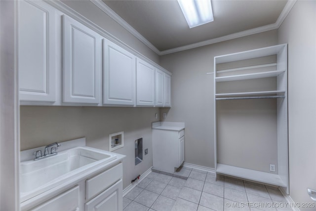 washroom featuring hookup for a washing machine, light tile patterned floors, hookup for an electric dryer, cabinet space, and ornamental molding