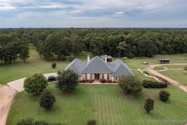 bird's eye view with a forest view