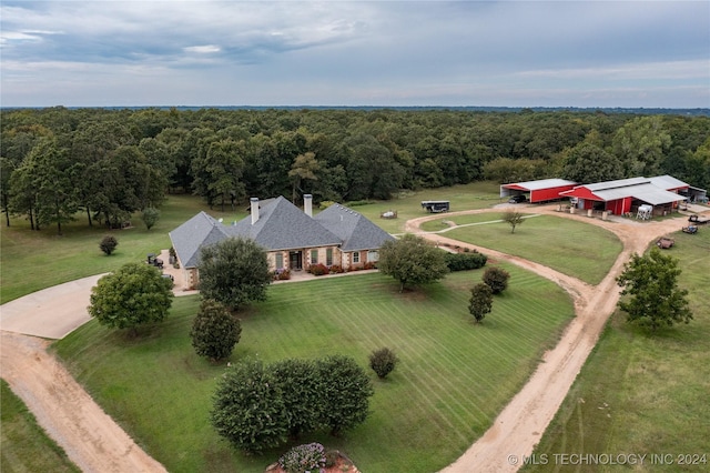 aerial view with a wooded view