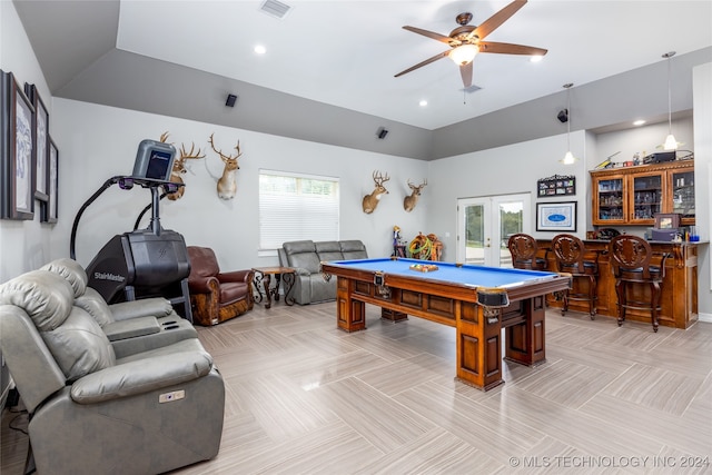 recreation room with lofted ceiling, billiards, french doors, bar area, and ceiling fan