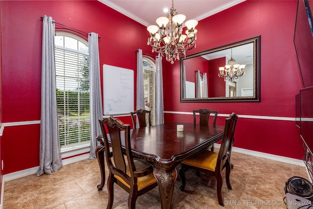 tiled dining space featuring an inviting chandelier, baseboards, and crown molding