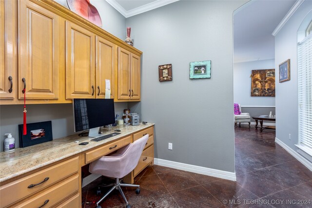 office area featuring built in desk and ornamental molding