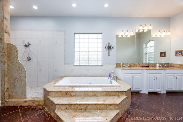 full bathroom featuring vanity, recessed lighting, a bath, and a tile shower