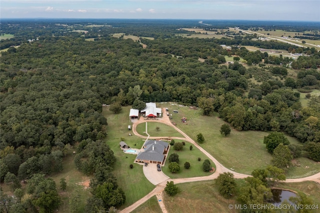 drone / aerial view with a forest view