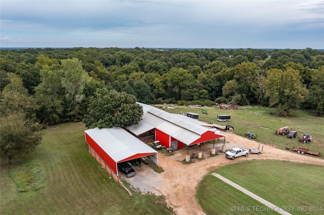 aerial view with a wooded view