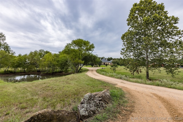 view of home's community featuring a water view