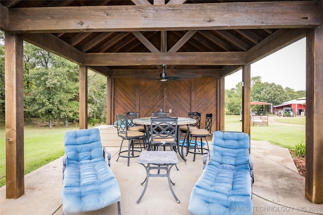 view of patio featuring outdoor dining space and a gazebo