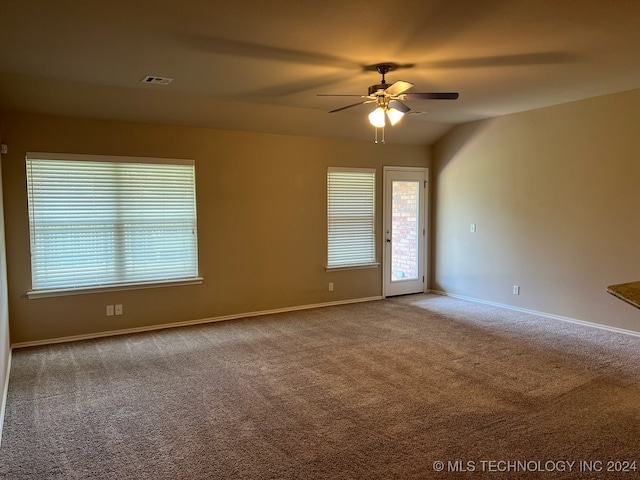 unfurnished room featuring carpet flooring and ceiling fan