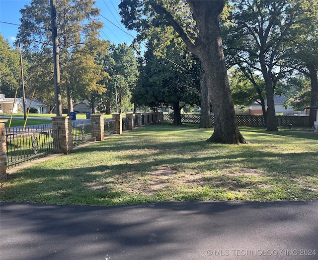 surrounding community with a lawn