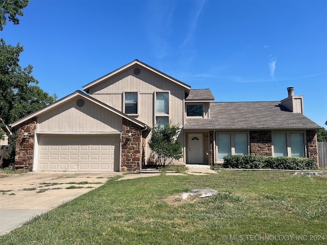 view of front of home with a front lawn