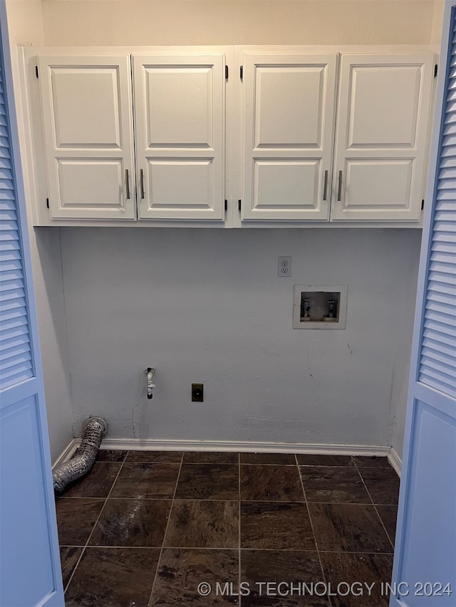 laundry room featuring hookup for a washing machine, cabinets, and electric dryer hookup