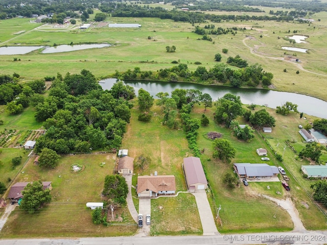 bird's eye view with a rural view and a water view