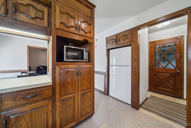 kitchen with white refrigerator