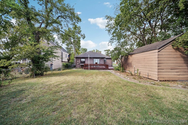 view of yard featuring a wooden deck