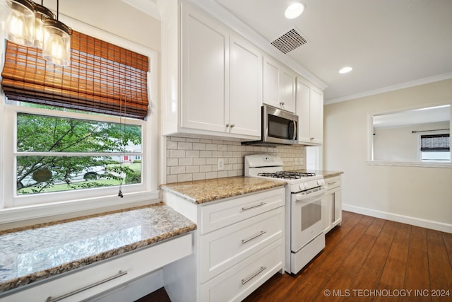 kitchen featuring white gas range, crown molding, light stone countertops, white cabinetry, and dark hardwood / wood-style floors