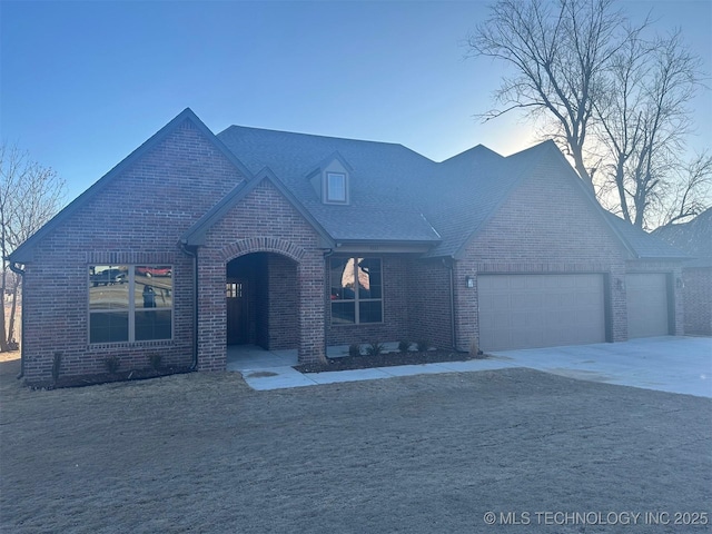 view of front of property with a garage