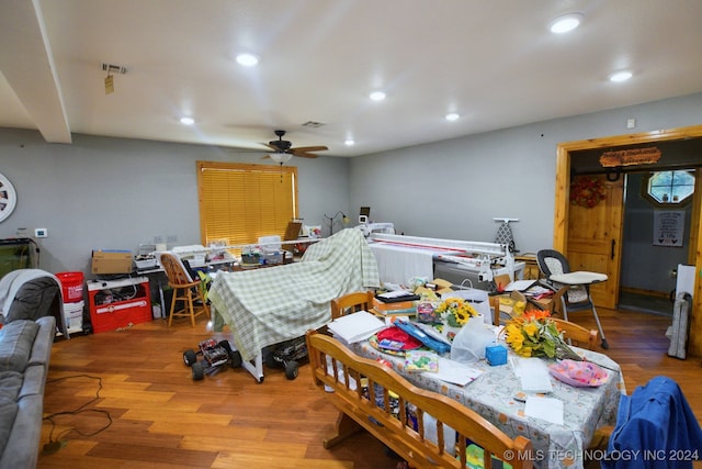 dining area featuring ceiling fan and hardwood / wood-style flooring