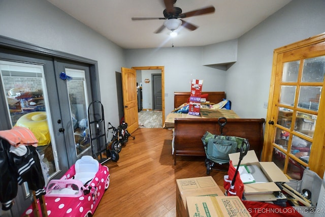 bedroom with hardwood / wood-style flooring and ceiling fan