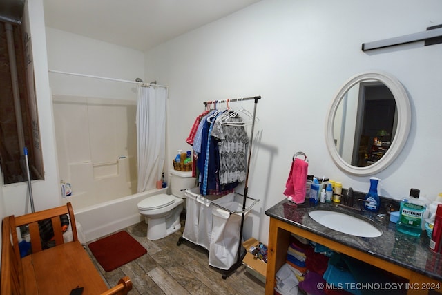 full bathroom featuring vanity, toilet, shower / tub combo with curtain, and wood-type flooring