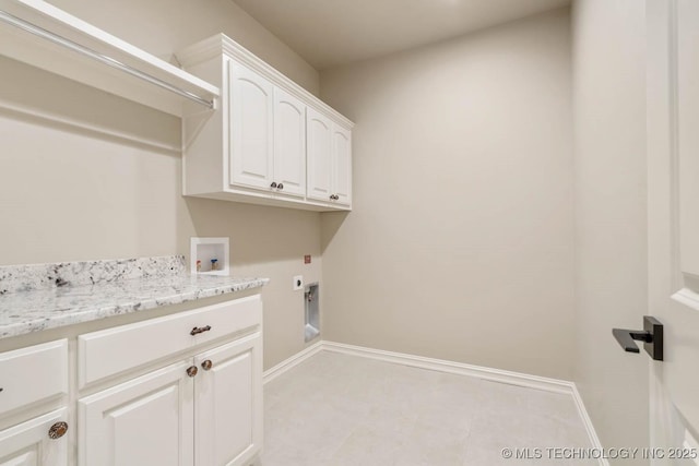 washroom with cabinets, washer hookup, and electric dryer hookup