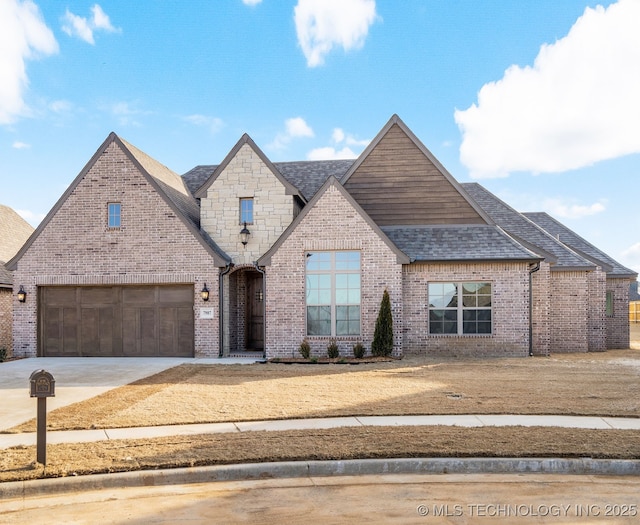 view of front of property featuring a garage