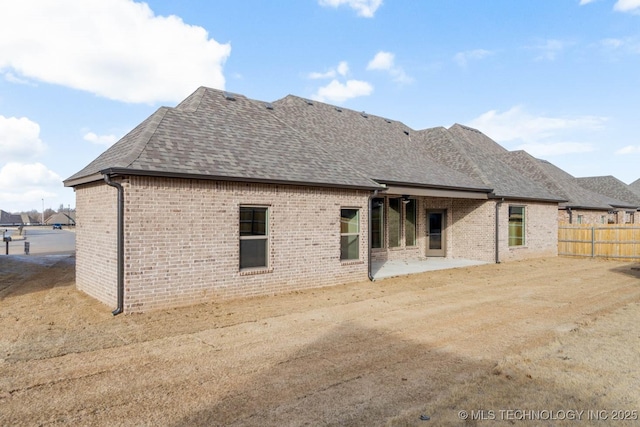 rear view of house with a patio