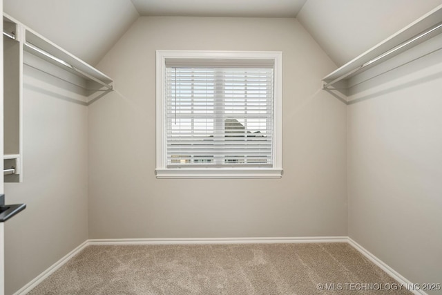 14504 E 80th St, Owasso, OK 74055 - walk in closet featuring carpet floors and lofted ceiling