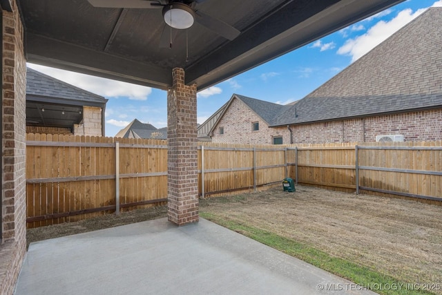 14504 E 80th St, Owasso, OK 74055 - view of patio with a ceiling fan and a fenced backyard