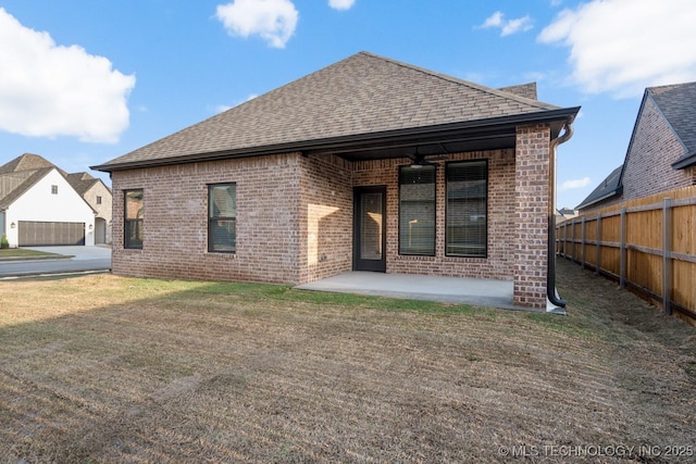 14504 E 80th St, Owasso, OK 74055 - rear view of house featuring a ceiling fan, brick siding, and roof with shingles
