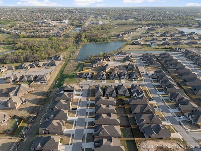 14504 E 80th St, Owasso, OK 74055 - drone / aerial view with a residential view and a water view