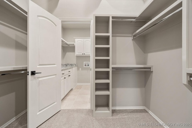 14504 E 80th St, Owasso, OK 74055 - spacious closet with light colored carpet